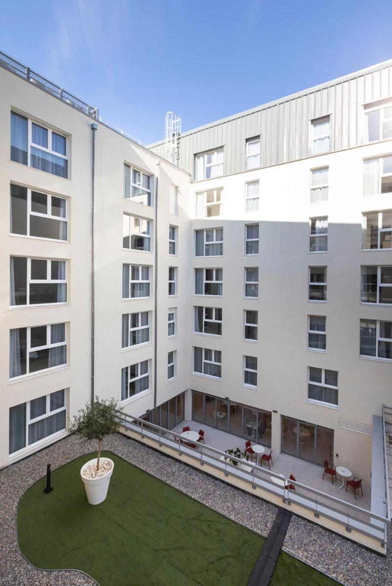 Oh Activ Nimes Aparthotel Bagian luar foto